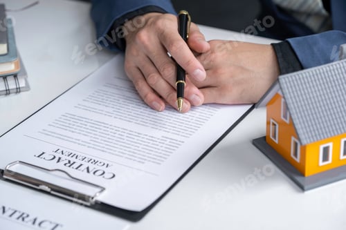 Preview: Real estate agent is reading and inspecting the sample homes and Business contract, lease, purchase,