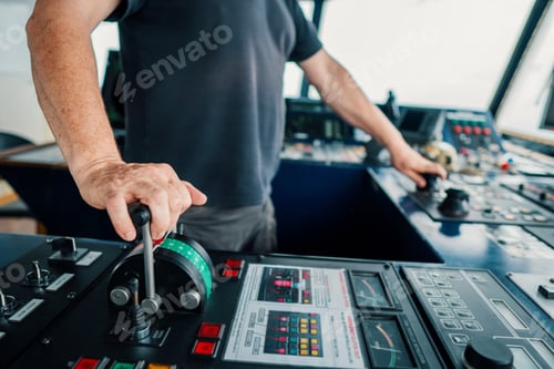 Preview: Captain of deck Officer on bridge of vessel or ship during navigaton watch at sea