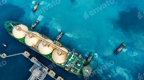 Preview: LNG (Liquefied natural gas) tanker anchored in Gas terminal gas tanks for storage. Oil Crude