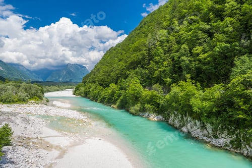 Preview: Turquoise Soca River Winding Through Lush Green Mountains