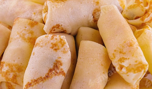 Preview: Delicious pancakes roll on close up