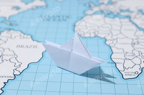 Preview: Concept of travel and adventure with paper boat