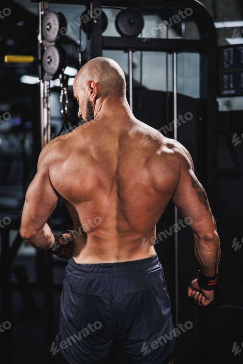 Preview: Bodybuilder Getting Ready To Weightlifting At The Gym