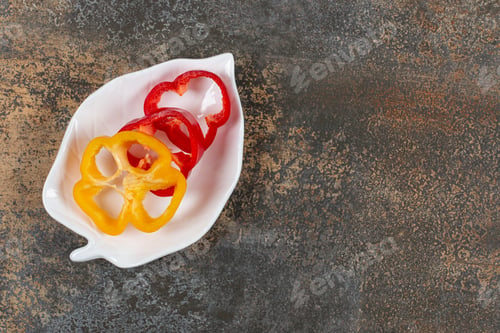 Preview: A bowl of sweet pepper , on the marble background