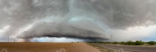 Preview: The skies full of clouds, above cornfields, a Severe-Warned Supercell storm.