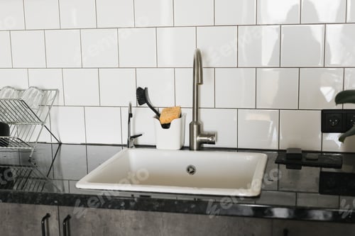 Preview: New ceramic sink and tap in stylish kitchen interior