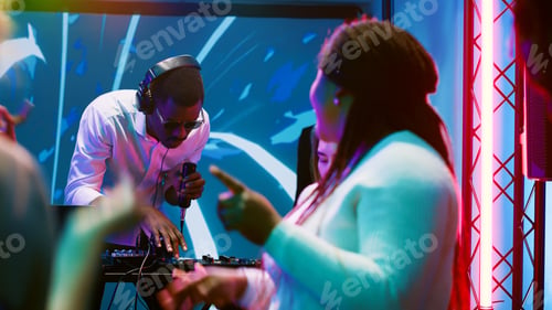 Preview: African american DJ having fun at club