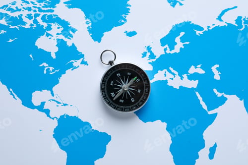 Preview: Traveling, adventure and vacation concept with compass