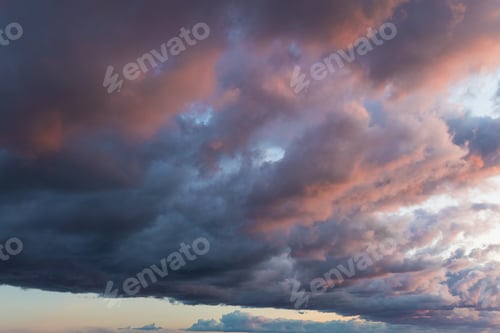 Preview: Amazing nature background. epic dramatic and moody pink, purple and blue cloudy sunset sky