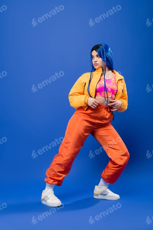 Preview: vibrant clothes, dyed hair, female model with blue hair posing