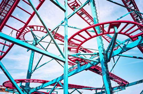 Preview: Roller coaster tracks in an amusement park.