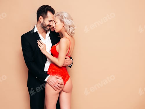 Preview: Beautiful woman and handsome man in studio