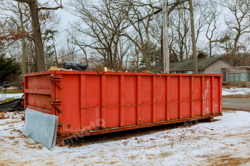 Preview: Trash bin at the side of street in winter with lip garbage container winter snow
