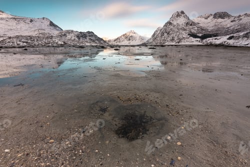 Preview: Picturesque majestic view of snowy mountains in sea