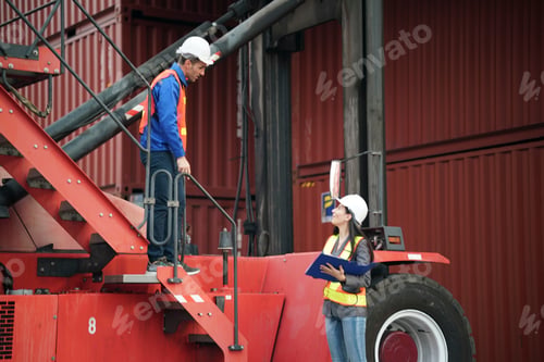 Preview: Warehouse workers discussing logistics at a shipping yard during day shift hours