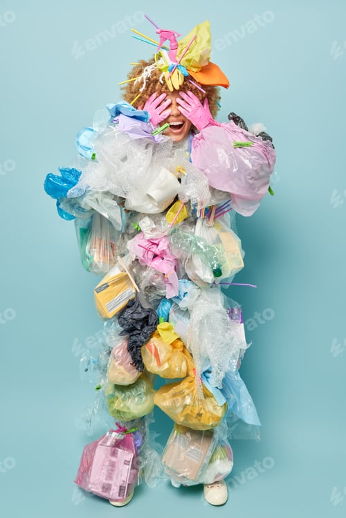 Preview: Full length shot of positive female volunteer covers eyes waits for surprise covered with plastic