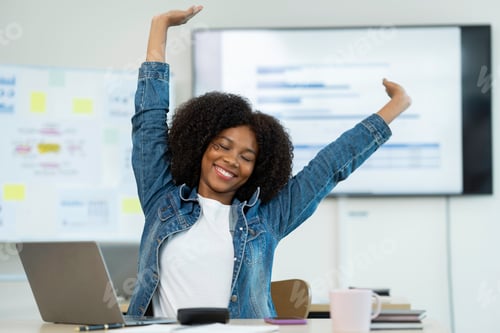Preview: A peaceful young African student raising her hand after school Breathe fresh air, sit at home, at yo