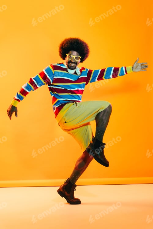Preview: African man portrait in studio on colorful background