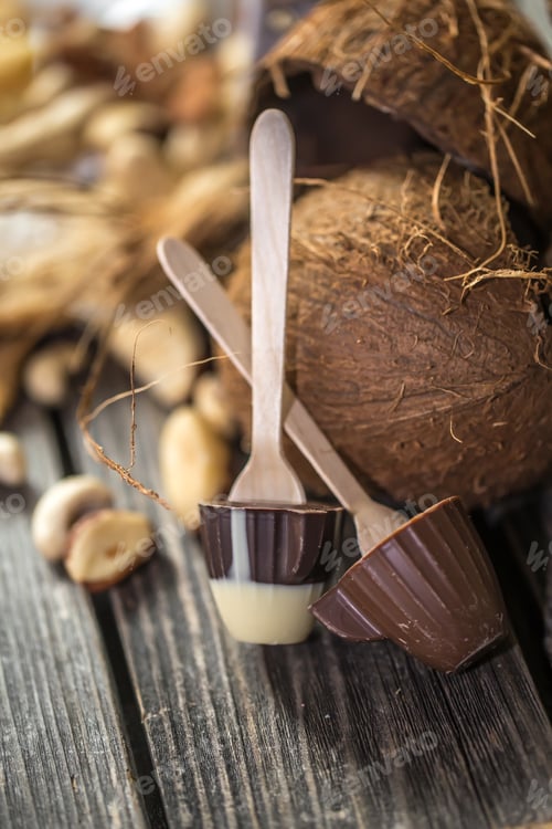 Preview: chocolate with coconut on wooden background