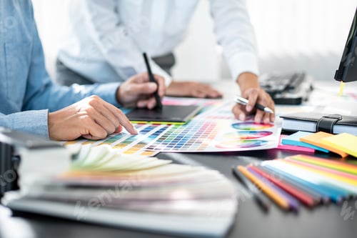 Preview: Team of creative graphic designer working on color swatch samples chart for selection coloring