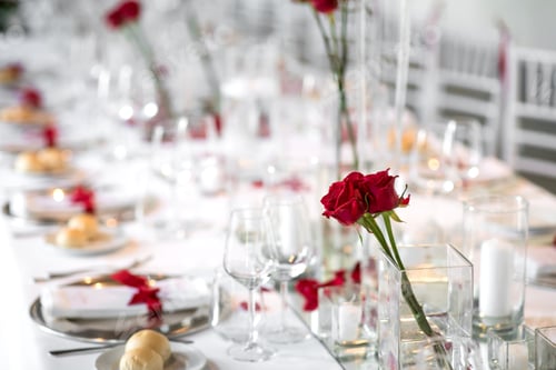 Preview: Formal dinner table setting with red roses