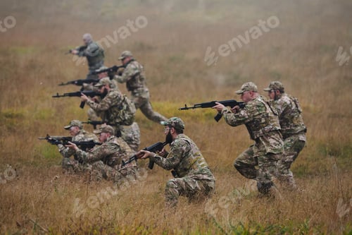 Preview: A disciplined and specialized military unit, donned in camouflage, strategically patrolling and