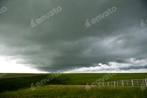 Preview: 55205,Storm clouds over rural landscape
