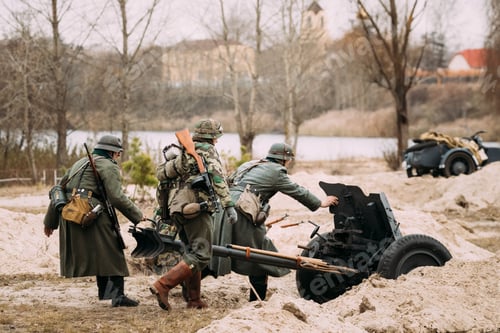 Preview: Re-enactors Dressed As German Wehrmacht Soldiers In WWII Roll Ou