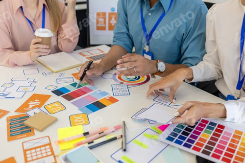 Preview: ux, ui, mobile app web designers are brainstorming to design a visual display