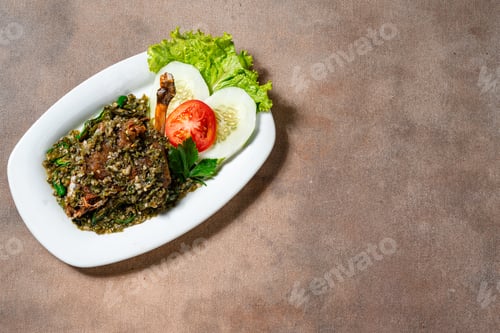 Preview: Bebek goreng cabe ijo or fried duck with green chili sauce.