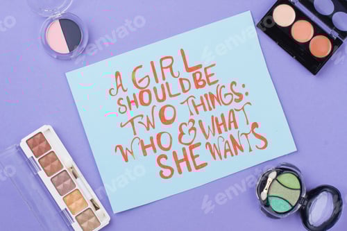 Preview: Make-up cosmetic powder cases on purple background.