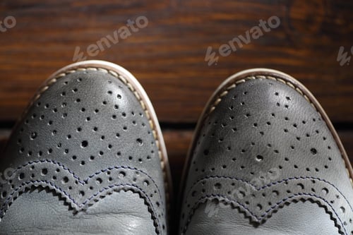 Preview: Grey oxford shoes on wooden background