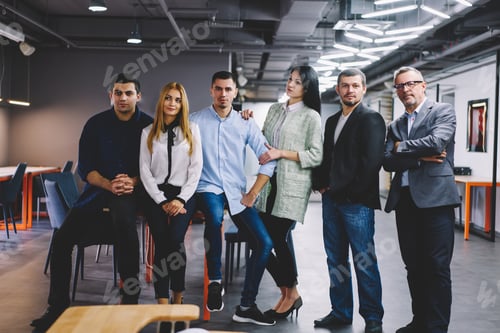 Preview: Smart casual corporate directors posing during time on job