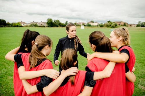 Preview: Rugby players and their coach gathering before a match