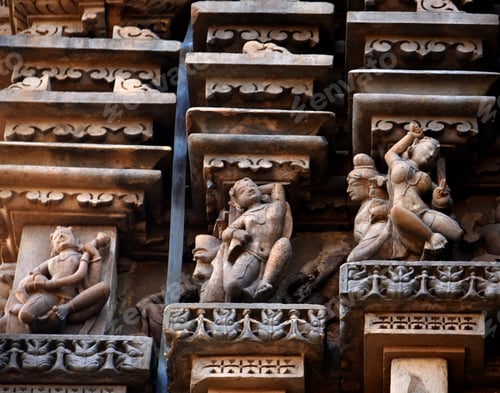 Preview: Stone carving bas relief sculptures on Khajuraho Temple, India.