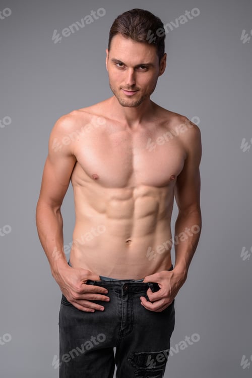 Preview: Studio shot of handsome muscular man shirtless