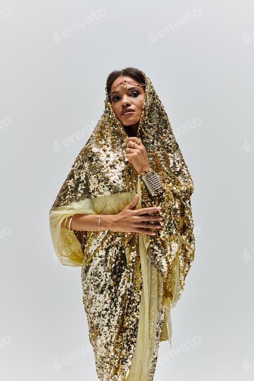Preview: Elegant African American goddess in a stunning golden dress in a serene studio