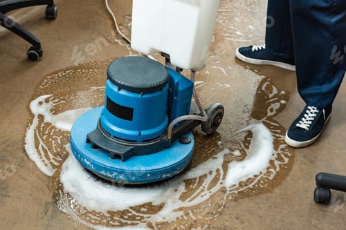 Preview: cropped view of cleaner washing floor with cleaning machine