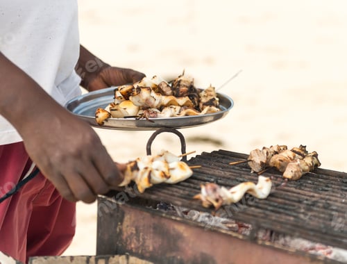 Preview: freshly barbecued seafood on grill