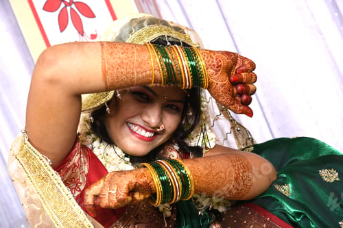 Preview: Indian bride wearing traditional wedding cloths in marriage ceremony.