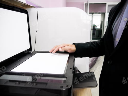Preview: Officer copying document with copier machine