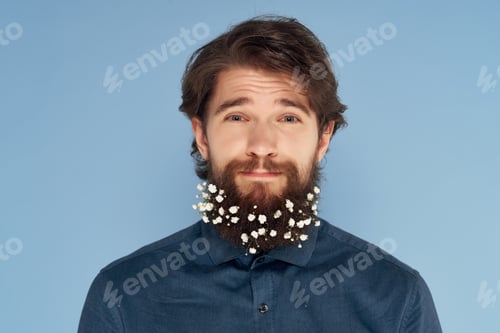 Preview: man with flowers in beard wearing shirt cropped view decoration emotion
