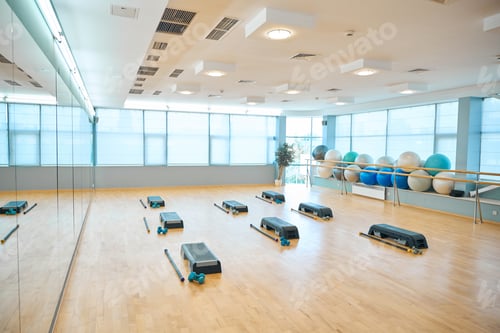 Preview: Training room is prepared for group pilates classes, special platforms