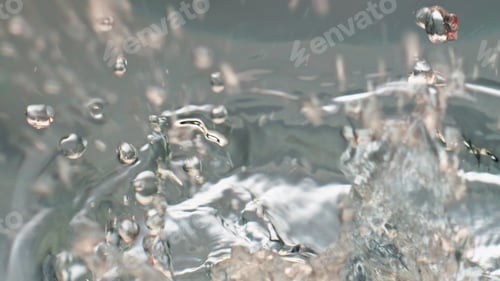 Preview: Closeup lime splashing water surface top view. Tropical organic citrus floating