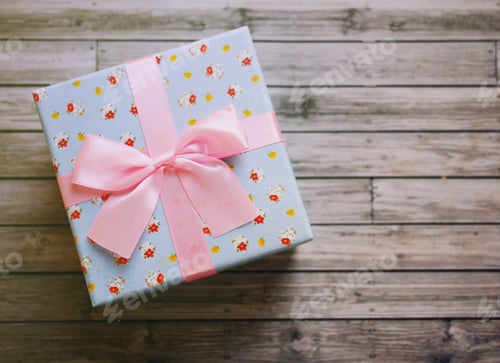 Preview: Wrapped Floral Gift on Wood Background, Festive Celebration