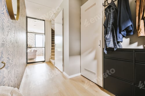 Preview: Wooden staircase in spacious hall of apartment