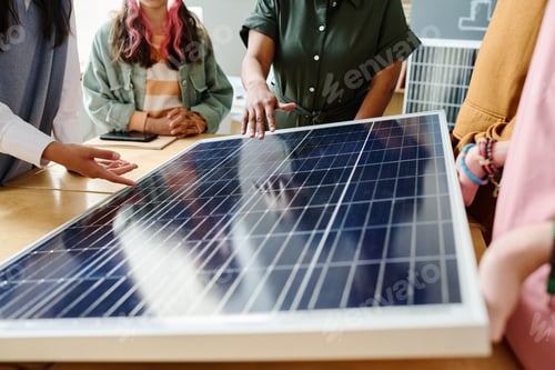Preview: Teacher showing the work of solar panel to students