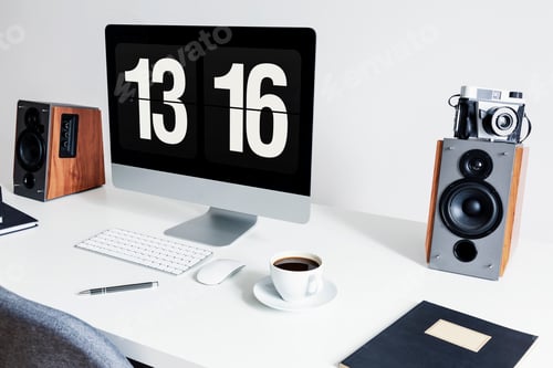 Preview: Close-up of a minimalist workspace with a desktop computer and s