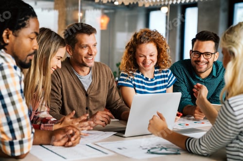 Preview: Group of young multi-ethnic startup business team collaborating on project in modern office