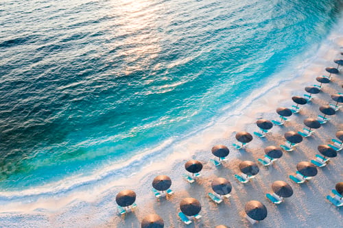 Preview: Sunrise over marble beach Porto Vathy in Thassos Island Greece